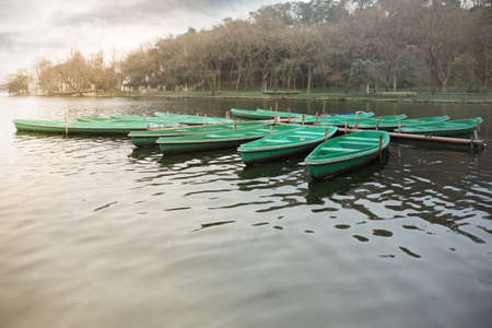 beautiful scenery of some boats in the west lake,hangzhou,Chinaの写真素材