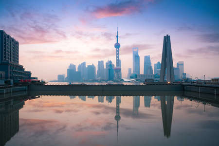 beautiful shanghai, rosy dawn reflection in the riverの写真素材