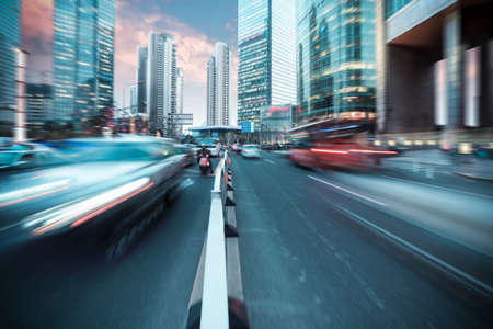 shanghai street at dusk,dynamic modern urban trafficの写真素材