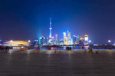 shanghai skyline with traveler ,beautiful night view of the metropolisの写真素材