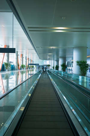moving escalator in the modern airport terminalのeditorial素材