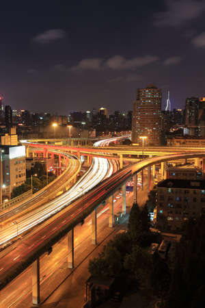 city highway overpass at night in shanghai,Chinaの写真素材