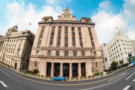 old buildings in shanghai with street scene of the bundの写真素材