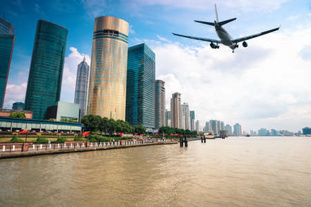 modern city with scheduled flight in shanghai