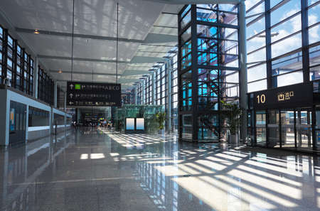 modern airport interior,terminal exit and flight in shanghai,Chinaのeditorial素材