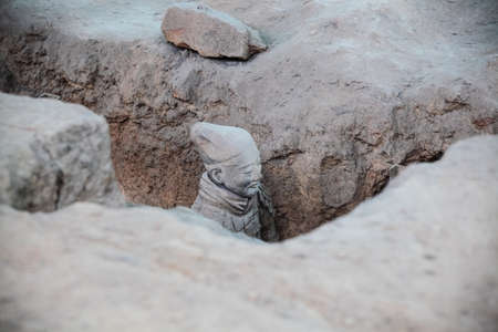 closeup of a terra cotta warrior in the pitのeditorial素材