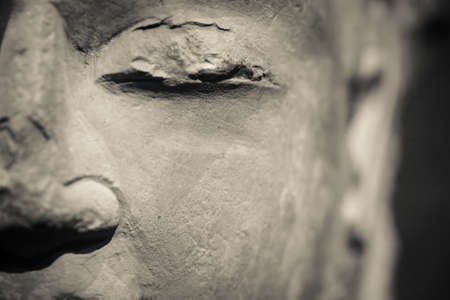religion stone sculpture of buddha closeupの写真素材