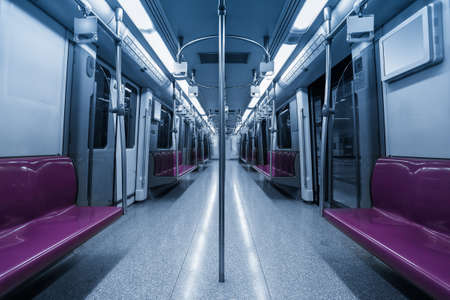 inside the subway cars,empty purple seatのeditorial素材