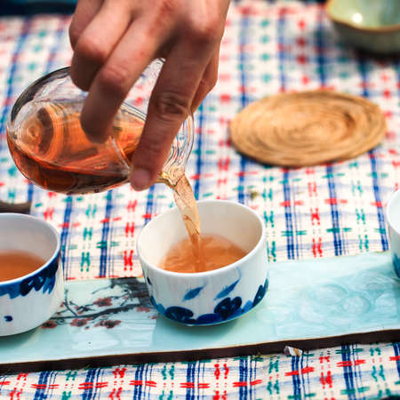 closeup of pour tea,tea ceremonyの写真素材