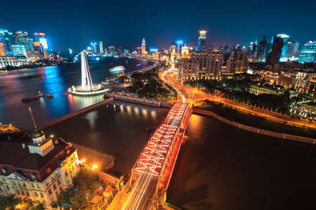 beautiful shanghai at night,light trails on the bund and garden bridgeの写真素材