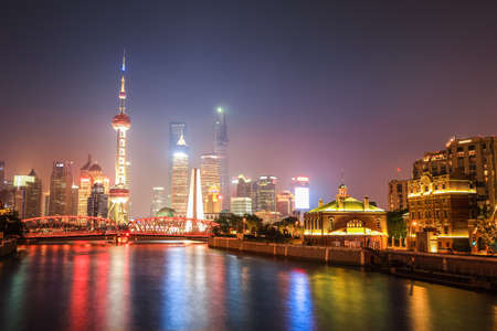 night scene of shanghai skyline with suzhou river ,China.のeditorial素材