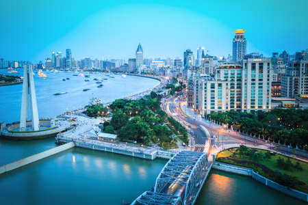 overlooking the bund in nightfall , shanghai , Chinaの写真素材