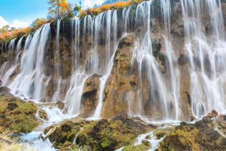 beautiful waterfall in autumn at jiuzhaigou valley national park,Chinaの写真素材
