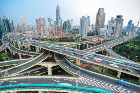 overlooking the vehicle motion blur on shanghai elevated road junction and interchange overpass