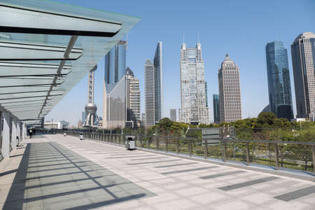 cityscape of shanghai financial center on sightseeing platform bridge