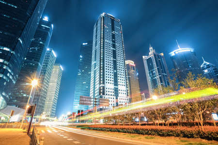 modern shanghai at night ,futuristic city with light trailsの写真素材