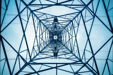 upward view of the structure under power transmission tower 
の写真素材