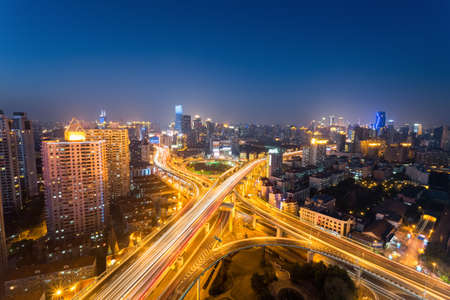 city highway junction of two elevated road in shanghai yanan west ,night sceneの写真素材