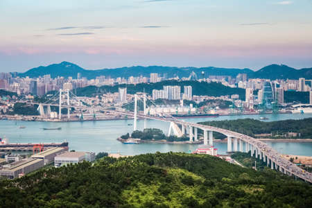 a bird's eye view of the bridge in xiamen haicang at duskのeditorial素材
