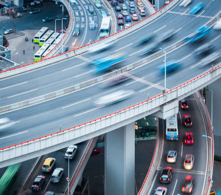 automobile motion blur on the approach bridge , abstract busy traffic closeupの写真素材