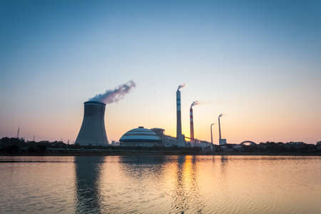 coal fired power station in sunset , industrial landscapeのeditorial素材