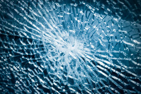 broken armoured glass closeup , background of glass was smashedの写真素材