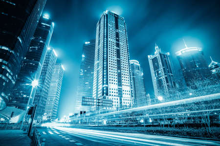 modern building at night with light trails in shanghai financial districtのeditorial素材