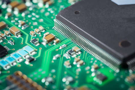 electronic board closeup , microelectronics and semiconductors industry backgroundの写真素材
