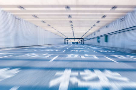 airport tunnel highway with dynamic motion blur in shanghaiの写真素材