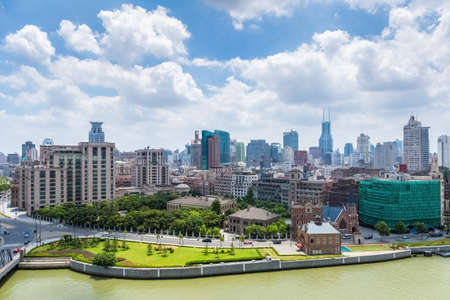 Huangpu district of shanghai against a sunny sky by suzhou riverside