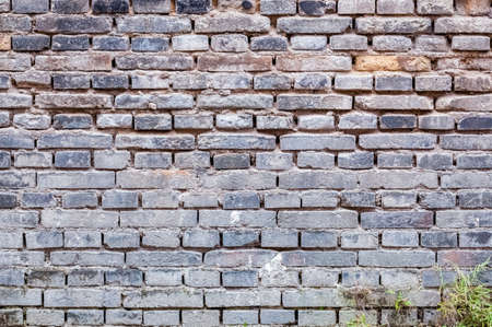 gray brick of old wall as backgroundの写真素材