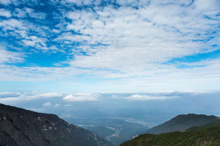 overlooking the cloudscape in lushan mountain ,blue sky backgroundの写真素材