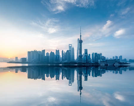 shanghai skyline with reflection in sunrise , Chinaのeditorial素材