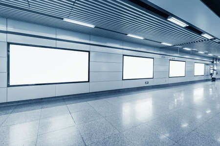 blank billboard in metro station with bright corridorのeditorial素材