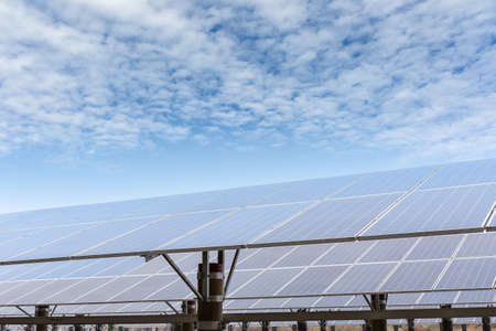 solar panels against a blue sky  ,renewable energy background