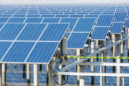 solar panels closeup in pond ,power plant using renewable energy