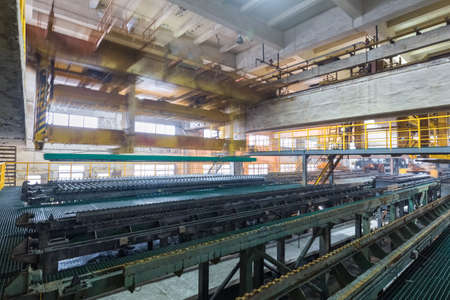 industrial production workshop closeup in a lead and zinc metal factory, automatic peeling zinc production lineのeditorial素材