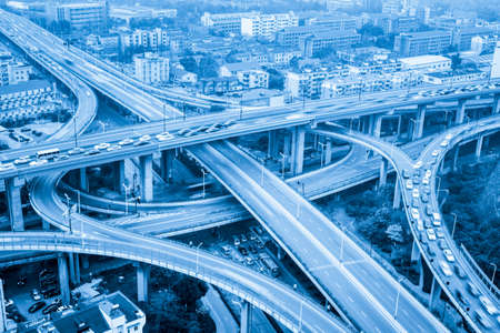 city highway interchange closeup ,motion blur with blue toneの写真素材