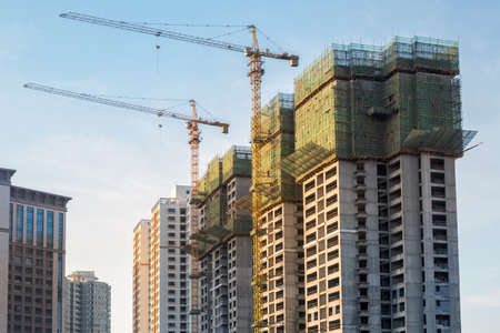 cranes on city construction site in the commodity house, Chinaのeditorial素材