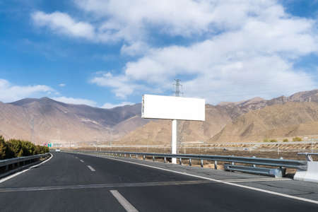 large billboard near the modern highway in tibetの写真素材