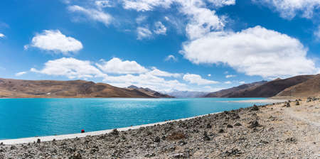 landscape with holy lake, mountain and pile of stone in  China.の写真素材