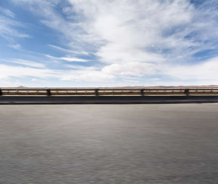 empty road motion blur against a blue sky, qinghai-tibet highway backgroundの写真素材