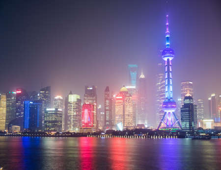 shanghai cityscape closeup , modern building of lujiazui financial and trade zone in mist nightのeditorial素材