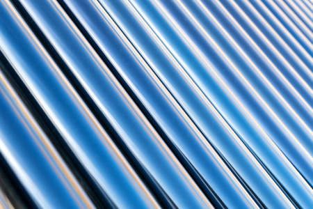 solar heat collector , blue vacuum tubes closeupの写真素材