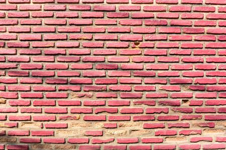 background of old vintage red brick wallの写真素材