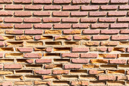 weathered texture of old brick walls closeupの写真素材
