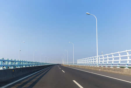 zhoushan cross-sea bridge, front view from car, road background