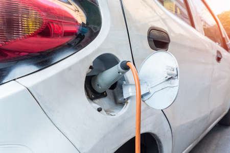 charging an electric car , cheap new energy vehiclesの写真素材