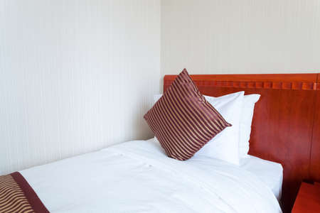 single bed closeup in  room