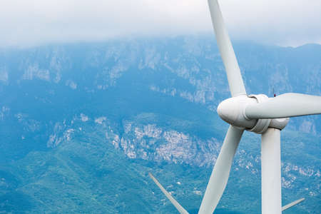 renewable energy closeup, wind power generation with cliff backgroundの写真素材